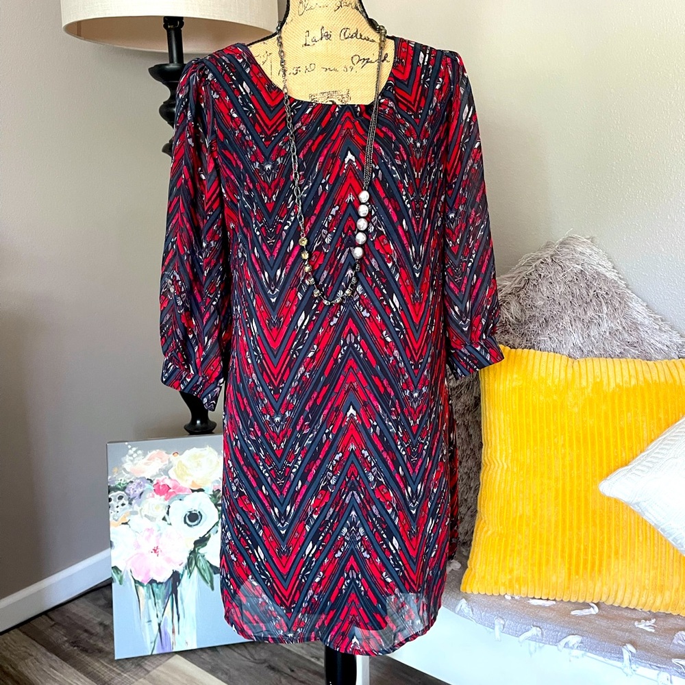 Adorable sheath dress with fun back!